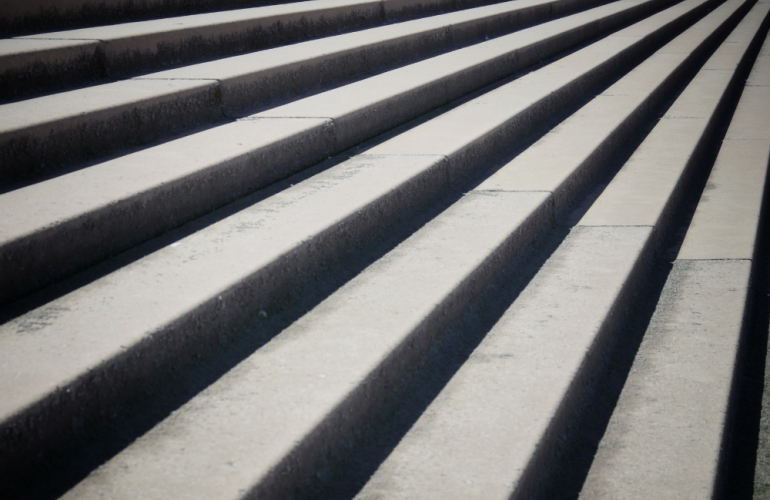 Concrete steps leading down to the sea.